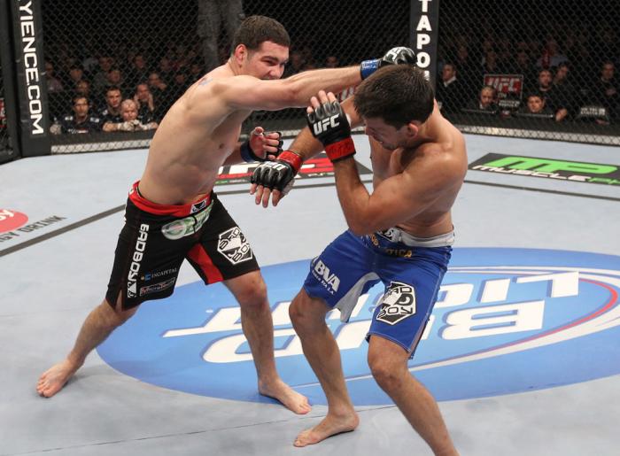 CHICAGO, IL - JANUARY 28: (L-R) Chris Weidman punches Demian Maia during the UFC on FOX event at United Center on January 28, 2012 in Chicago, Illinois. (Photo by Nick Laham/Zuffa LLC/Zuffa LLC via Getty Images) *** Local Caption *** Chris Weidman; Demi
