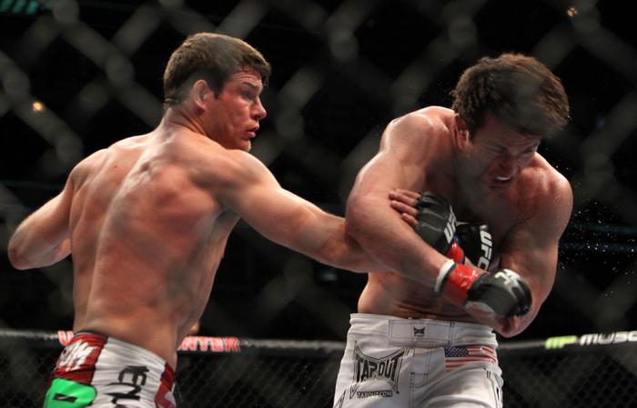 CHICAGO, IL - JANUARY 28: (L-R) Michael Bisping punches Chael Sonnen during the UFC on FOX event at United Center on January 28, 2012 in Chicago, Illinois. (Photo by Josh Hedges/Zuffa LLC/Zuffa LLC via Getty Images) *** Local Caption *** Chael Sonnen; M