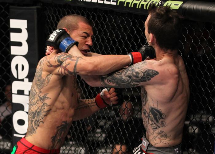 CHICAGO, IL - JANUARY 28: (L-R) Cub Swanson punches George Roop during the UFC on FOX event at United Center on January 28, 2012 in Chicago, Illinois. (Photo by Nick Laham/Zuffa LLC/Zuffa LLC via Getty Images) *** Local Caption *** George Roop; Cub Swan