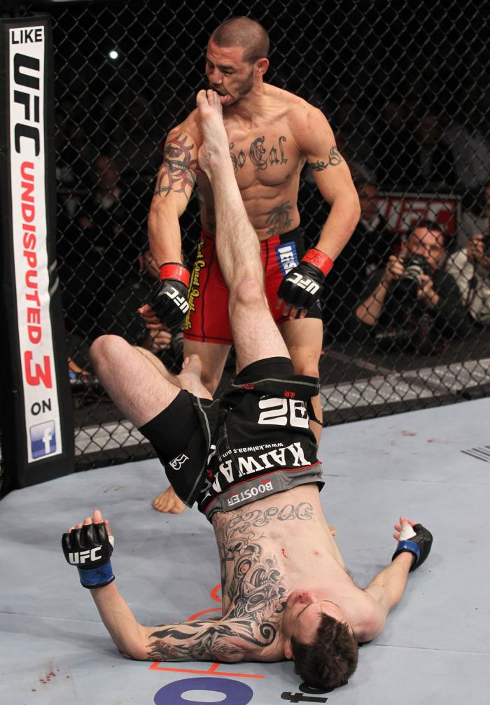 CHICAGO, IL - JANUARY 28: George Roop kicks up at Cub Swanson from the bottom during the UFC on FOX event at United Center on January 28, 2012 in Chicago, Illinois. (Photo by Nick Laham/Zuffa LLC/Zuffa LLC via Getty Images) *** Local Caption *** Cub Swa