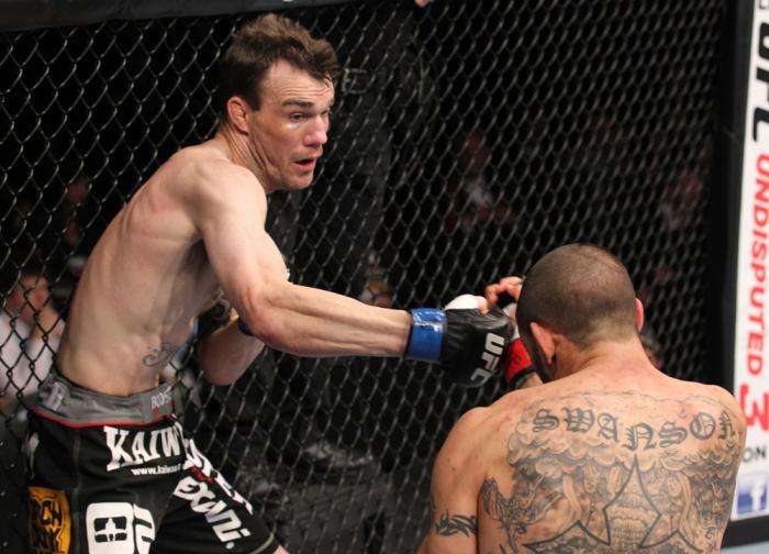 CHICAGO, IL - JANUARY 28: (L-R) George Roop punches Cub Swanson from the bottom during the UFC on FOX event at United Center on January 28, 2012 in Chicago, Illinois. (Photo by Nick Laham/Zuffa LLC/Zuffa LLC via Getty Images) *** Local Caption *** Cub S