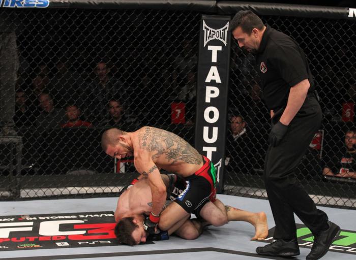 CHICAGO, IL - JANUARY 28: (R-L) Cub Swanson defeats George Roop by TKO due to punches during the UFC on FOX event at United Center on January 28, 2012 in Chicago, Illinois. (Photo by Nick Laham/Zuffa LLC/Zuffa LLC via Getty Images) *** Local Caption ***