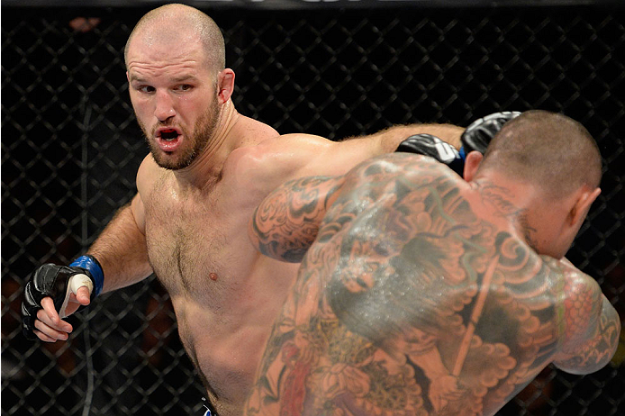 BARUERI, BRAZIL - OCTOBER 9: (L-R) Matt Hamill punches Thiago Silva in their light heavyweight bout during the UFC Fight Night event at the Ginasio Jose Correa on October 9, 2013 in Barueri, Sao Paulo, Brazil. (Photo by Jeff Bottari/Zuffa LLC/Zuffa LLC v