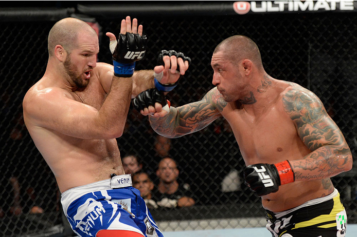 BARUERI, BRAZIL - OCTOBER 9: (R-L) Thiago Silva punches Matt Hamill in their light heavyweight bout during the UFC Fight Night event at the Ginasio Jose Correa on October 9, 2013 in Barueri, Sao Paulo, Brazil. (Photo by Jeff Bottari/Zuffa LLC/Zuffa LLC v