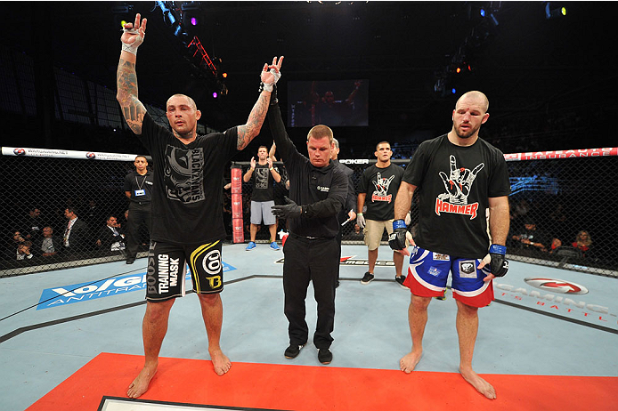 BARUERI, BRAZIL - OCTOBER 9: (L-R) Thiago Silva celebrates after defeating Matt Hamill in their light heavyweight bout during the UFC Fight Night event at the Ginasio Jose Correa on October 9, 2013 in Barueri, Sao Paulo, Brazil. (Photo by Jeff Bottari/Zu
