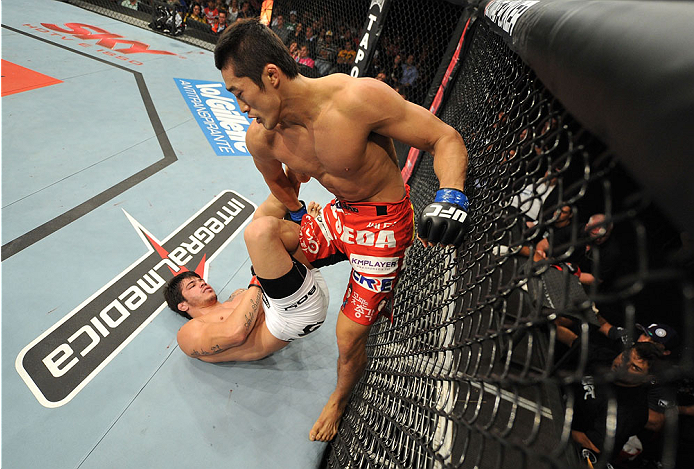 BARUERI, BRAZIL - OCTOBER 9: (R-L) Dong Hyun Kim looks to strike Erick Silva in their welterweight bout during the UFC Fight Night event at the Ginasio Jose Correa on October 9, 2013 in Barueri, Sao Paulo, Brazil. (Photo by Jeff Bottari/Zuffa LLC/Zuffa L