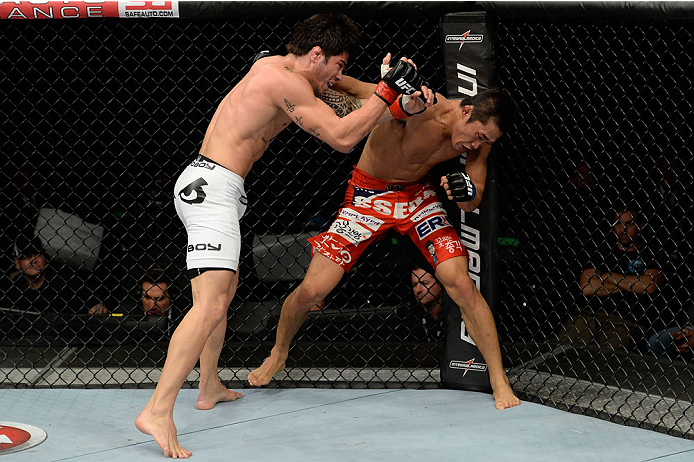 BARUERI, BRAZIL - OCTOBER 9: (L-R) Dong Hyun Kim punches Erick Silva in their welterweight bout during the UFC Fight Night event at the Ginasio Jose Correa on October 9, 2013 in Barueri, Sao Paulo, Brazil. (Photo by Jeff Bottari/Zuffa LLC/Zuffa LLC via G