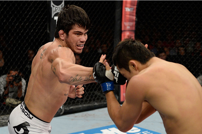 BARUERI, BRAZIL - OCTOBER 9: (L-R) Erick Silva punches Dong Hyun Kim in their welterweight bout during the UFC Fight Night event at the Ginasio Jose Correa on October 9, 2013 in Barueri, Sao Paulo, Brazil. (Photo by Jeff Bottari/Zuffa LLC/Zuffa LLC via G