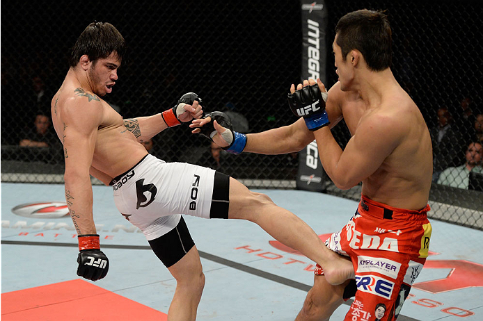 BARUERI, BRAZIL - OCTOBER 9: (L-R) Erick Silva kicks Dong Hyun Kim in their welterweight bout during the UFC Fight Night event at the Ginasio Jose Correa on October 9, 2013 in Barueri, Sao Paulo, Brazil. (Photo by Jeff Bottari/Zuffa LLC/Zuffa LLC via Get