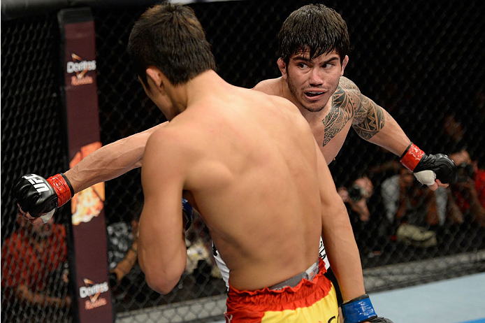 BARUERI, BRAZIL - OCTOBER 9: (R-L) Erick Silva punches Dong Hyun Kim in their welterweight bout during the UFC Fight Night event at the Ginasio Jose Correa on October 9, 2013 in Barueri, Sao Paulo, Brazil. (Photo by Jeff Bottari/Zuffa LLC/Zuffa LLC via G