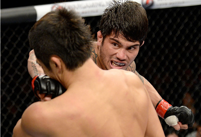 BARUERI, BRAZIL - OCTOBER 9: (R-L) Erick Silva punches Dong Hyun Kim in their welterweight bout during the UFC Fight Night event at the Ginasio Jose Correa on October 9, 2013 in Barueri, Sao Paulo, Brazil. (Photo by Jeff Bottari/Zuffa LLC/Zuffa LLC via G