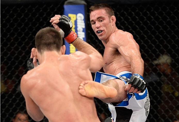 BARUERI, BRAZIL - OCTOBER 9: (R-L) Jake Shields kicks Demian Maia in their welterweight bout during the UFC Fight Night event at the Ginasio Jose Correa on October 9, 2013 in Barueri, Sao Paulo, Brazil. (Photo by Jeff Bottari/Zuffa LLC/Zuffa LLC via Gett