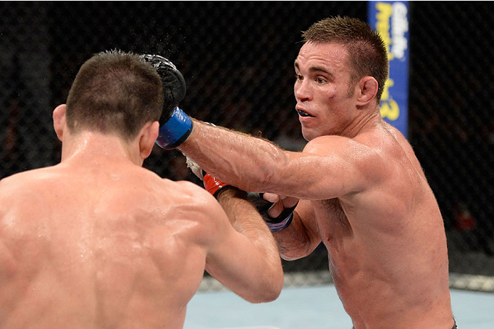 BARUERI, BRAZIL - OCTOBER 9: (R-L) Jake Shields punches Demian Maia in their welterweight bout during the UFC Fight Night event at the Ginasio Jose Correa on October 9, 2013 in Barueri, Sao Paulo, Brazil. (Photo by Jeff Bottari/Zuffa LLC/Zuffa LLC via Ge