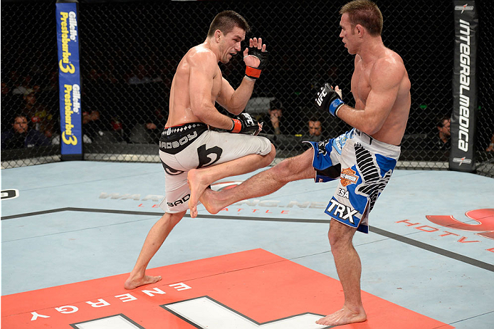 BARUERI, BRAZIL - OCTOBER 9: (R-L) Jake Shields kicks Demian Maia in their welterweight bout during the UFC Fight Night event at the Ginasio Jose Correa on October 9, 2013 in Barueri, Sao Paulo, Brazil. (Photo by Jeff Bottari/Zuffa LLC/Zuffa LLC via Gett