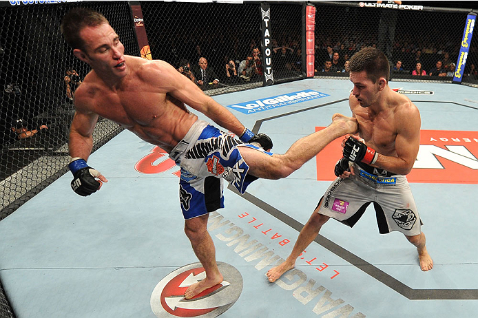 BARUERI, BRAZIL - OCTOBER 9: (L-R) Jake Shields kicks Demian Maia in their welterweight bout during the UFC Fight Night event at the Ginasio Jose Correa on October 9, 2013 in Barueri, Sao Paulo, Brazil. (Photo by Jeff Bottari/Zuffa LLC/Zuffa LLC via Gett