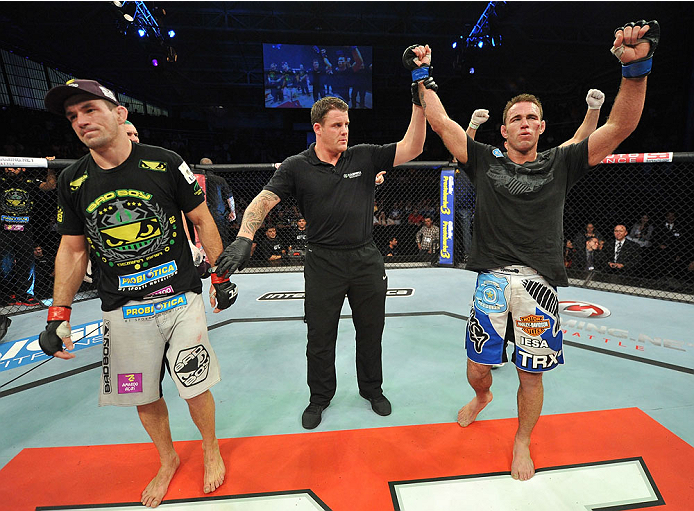 BARUERI, BRAZIL - OCTOBER 9: (R-L) Jake Shields celebrates after defeating Demian Maia in their welterweight bout during the UFC Fight Night event at the Ginasio Jose Correa on October 9, 2013 in Barueri, Sao Paulo, Brazil. (Photo by Jeff Bottari/Zuffa L