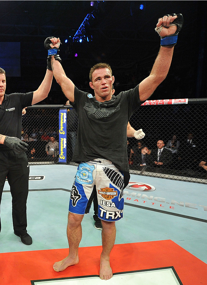 BARUERI, BRAZIL - OCTOBER 9: (R-L) Jake Shields celebrates after defeating Demian Maia in their welterweight bout during the UFC Fight Night event at the Ginasio Jose Correa on October 9, 2013 in Barueri, Sao Paulo, Brazil. (Photo by Jeff Bottari/Zuffa L