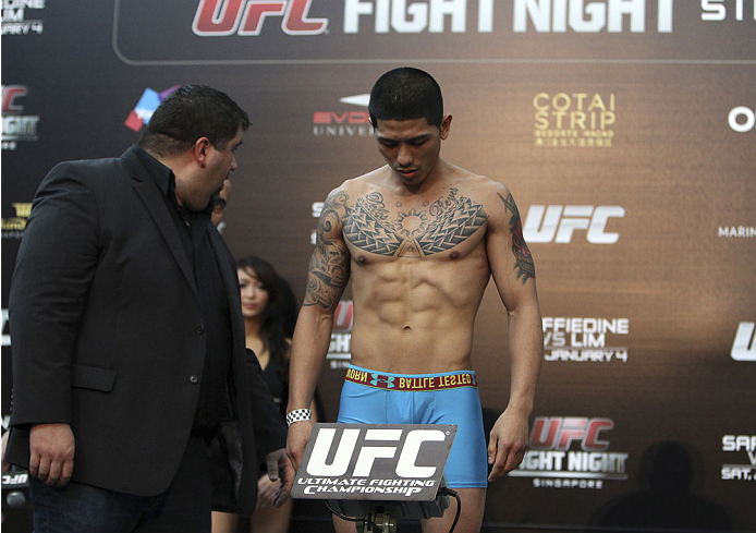 SINGAPORE - JANUARY 03: Jon Delos Reyes during the UFC Fight Night Singapore Weigh-in at the Shoppes at Marina Bay Sands on January 3, 2014 in Singapore. (Photo by Mitch Viquez/Zuffa LLC/Zuffa LLC via Getty Images)