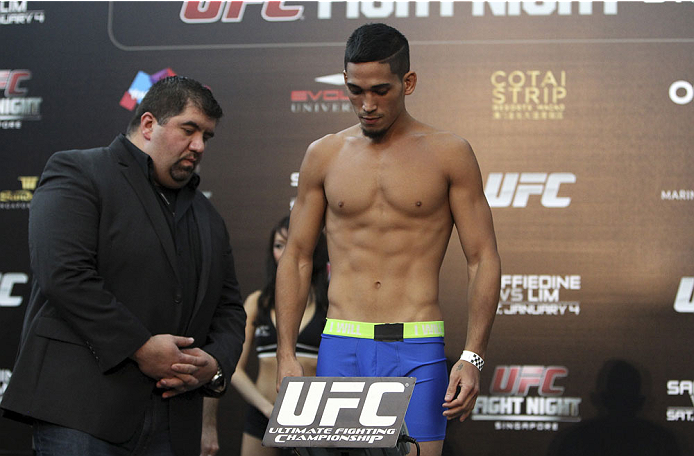 SINGAPORE - JANUARY 03: Dustin Kimura during the UFC Fight Night Singapore Weigh-in at the Shoppes at Marina Bay Sands on January 3, 2014 in Singapore. (Photo by Mitch Viquez/Zuffa LLC/Zuffa LLC via Getty Images)