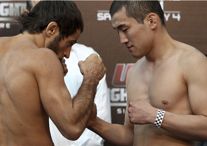 SINGAPORE - JANUARY 03: (L and R) Mairbek Taisumov and Bang Tae Hyun face off during the UFC Fight Night Singapore Weigh-in at the Shoppes at Marina Bay Sands on January 3, 2014 in Singapore. (Photo by Mitch Viquez/Zuffa LLC/Zuffa LLC via Getty Images)
