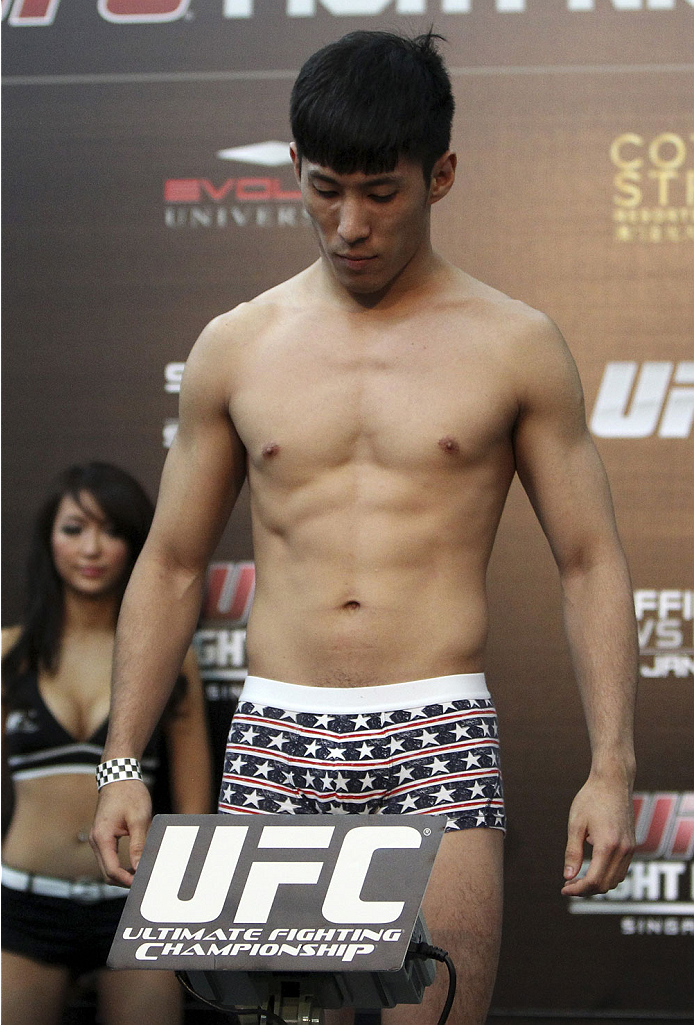 SINGAPORE - JANUARY 03: Royston Wee during the UFC Fight Night Singapore Weigh-in at the Shoppes at Marina Bay Sands on January 3, 2014 in Singapore. (Photo by Mitch Viquez/Zuffa LLC/Zuffa LLC via Getty Images)