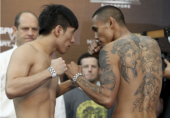 SINGAPORE - JANUARY 03: (L and R) Royston Wee and David Galera face off during the UFC Fight Night Singapore Weigh-in at the Shoppes at Marina Bay Sands on January 3, 2014 in Singapore. (Photo by Mitch Viquez/Zuffa LLC/Zuffa LLC via Getty Images)