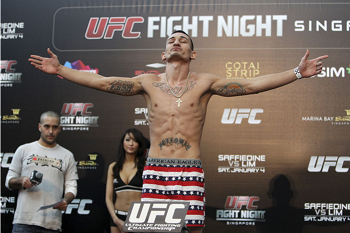 SINGAPORE - JANUARY 03: Max Holloway during the UFC Fight Night Singapore Weigh-in at the Shoppes at Marina Bay Sands on January 3, 2014 in Singapore. (Photo by Mitch Viquez/Zuffa LLC/Zuffa LLC via Getty Images)