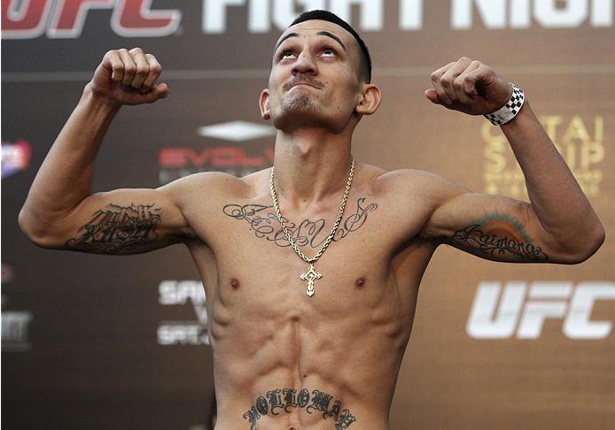 SINGAPORE - JANUARY 03: Max Holloway during the UFC Fight Night Singapore Weigh-in at the Shoppes at Marina Bay Sands on January 3, 2014 in Singapore. (Photo by Mitch Viquez/Zuffa LLC/Zuffa LLC via Getty Images)