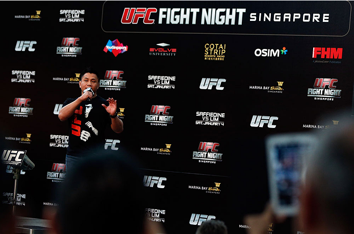 SINGAPORE - JANUARY 03: Cung Le interacts with fans during a Q&A session before the UFC Fight Night Singapore Weigh-in at the Shoppes at Marina Bay Sands on January 3, 2014 in Singapore. (Photo by Josh Hedges/Zuffa LLC/Zuffa LLC via Getty Images)