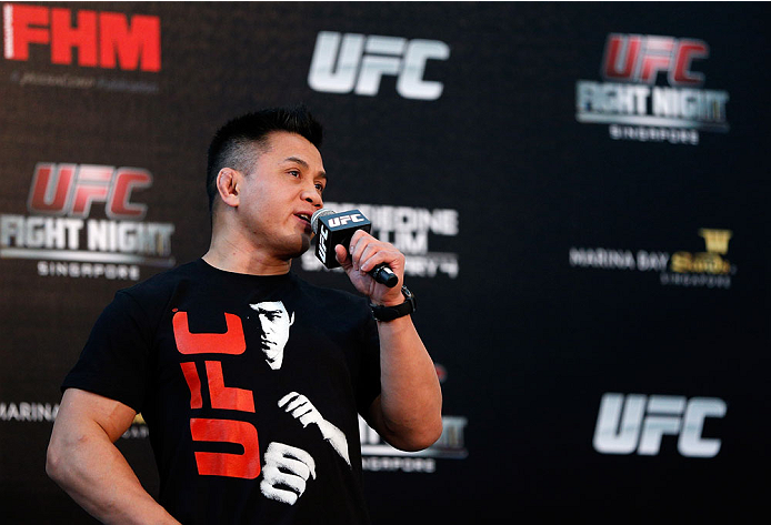 SINGAPORE - JANUARY 03: Cung Le interacts with fans during a Q&A session before the UFC Fight Night Singapore Weigh-in at the Shoppes at Marina Bay Sands on January 3, 2014 in Singapore. (Photo by Josh Hedges/Zuffa LLC/Zuffa LLC via Getty Images)