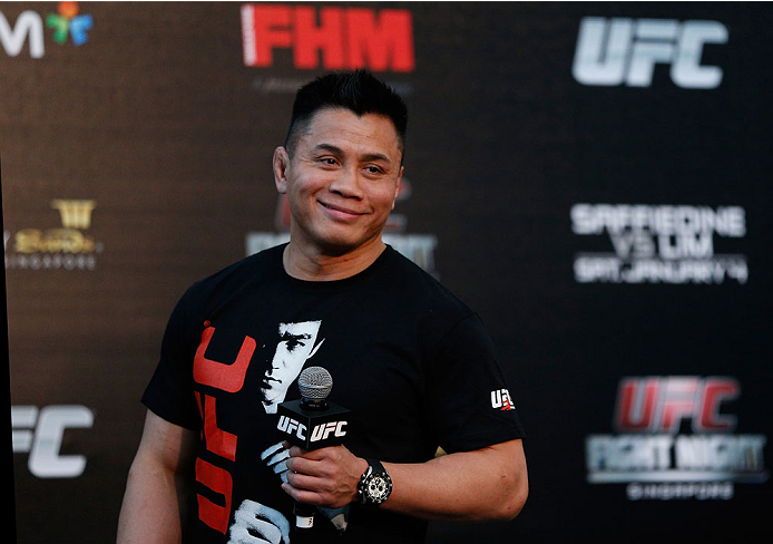 SINGAPORE - JANUARY 03: Cung Le interacts with fans during a Q&A session before the UFC Fight Night Singapore Weigh-in at the Shoppes at Marina Bay Sands on January 3, 2014 in Singapore. (Photo by Josh Hedges/Zuffa LLC/Zuffa LLC via Getty Images)