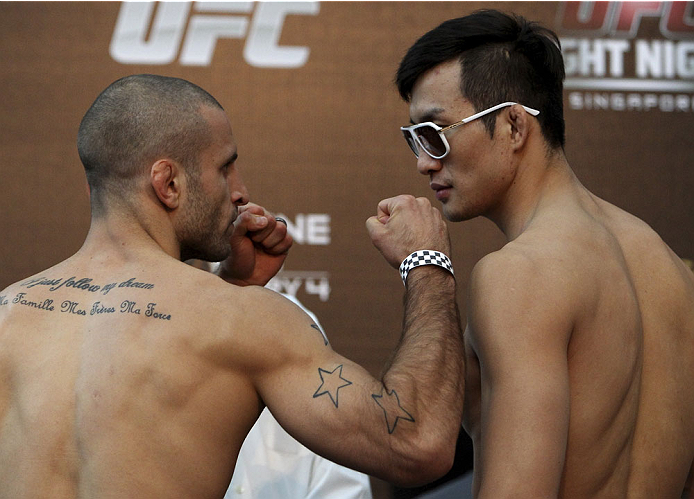 SINGAPORE - JANUARY 03: (L and R) Tarec Saffiedine and Lim Hyun Gyu face off during the UFC Fight Night Singapore Weigh-in at the Shoppes at Marina Bay Sands on January 3, 2014 in Singapore. (Photo by Mitch Viquez/Zuffa LLC/Zuffa LLC via Getty Images)