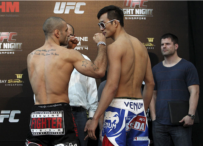 SINGAPORE - JANUARY 03: (L and R) Tarec Saffiedine and Lim Hyun Gyu face off during the UFC Fight Night Singapore Weigh-in at the Shoppes at Marina Bay Sands on January 3, 2014 in Singapore. (Photo by Mitch Viquez/Zuffa LLC/Zuffa LLC via Getty Images)