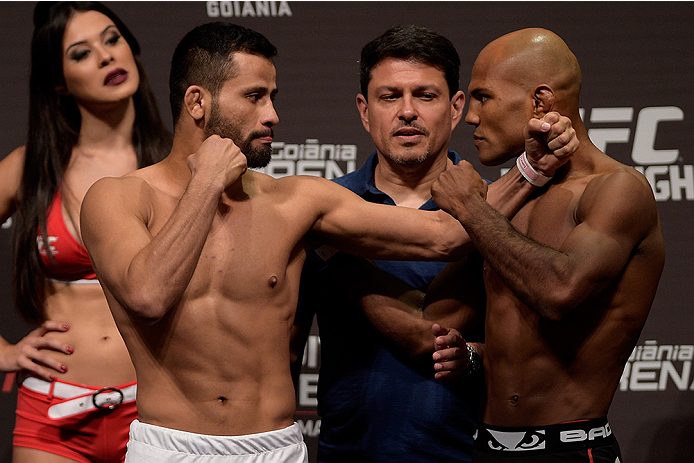 GOIANIA, BRAZIL - MAY 29: Flyweight fighters Jussier Formiga (L) and Wilson Reis of Brazil face off during the UFC Fight Night Weigh-ins at Goiania Arena on May 29, 2015 in Goiania, Brazil. (Photo by Buda Mendes/Zuffa LLC/Zuffa LLC via Getty Images)