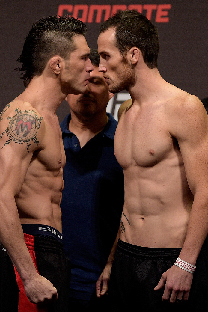GOIANIA, BRAZIL - MAY 29: Featherweight fighters Rony Jason of Brazil and Damon Jackson of United States face off during the UFC Fight Night Weigh-ins at Goiania Arena on May 29, 2015 in Goiania, Brazil. (Photo by Buda Mendes/Zuffa LLC/Zuffa LLC via Getty
