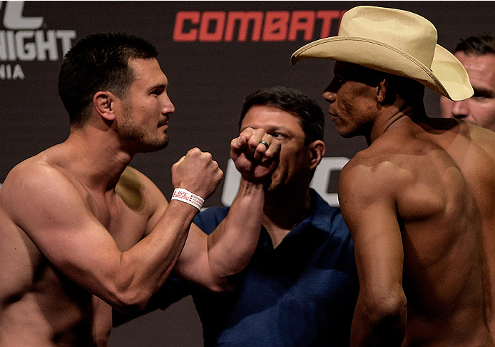 GOIANIA, BRAZIL - MAY 29: Welterweight fighter KJ Noons of the United States (L) and Alex Oliveira of Brazil face off during the UFC Fight Night Weigh-ins at Goiania Arena on May 29, 2015 in Goiania, Brazil. (Photo by Buda Mendes/Zuffa LLC/Zuffa LLC via G
