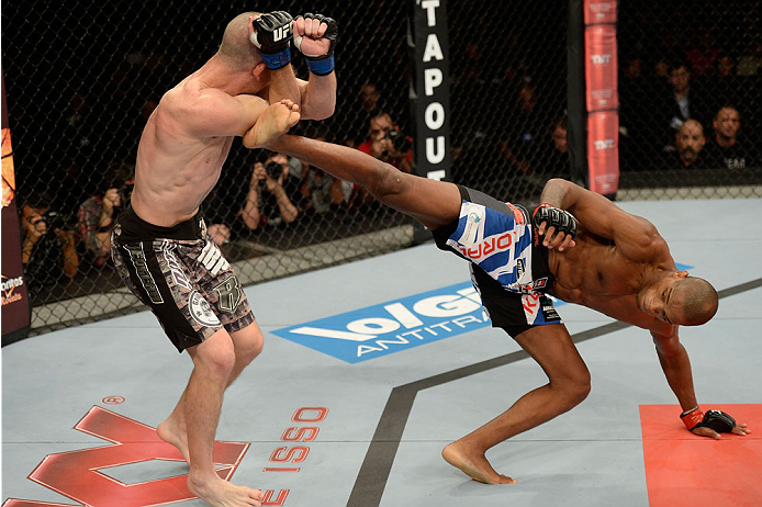 BARUERI, BRAZIL - OCTOBER 9: (R-L) Alan Patrick kicks Garett Whiteley in their lightweight bout during the UFC Fight Night event at the Ginasio Jose Correa on October 9, 2013 in Barueri, Sao Paulo, Brazil. (Photo by Jeff Bottari/Zuffa LLC/Zuffa LLC via G