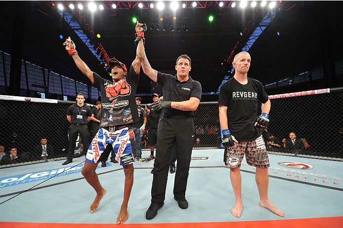 BARUERI, BRAZIL - OCTOBER 9: (L-R) Alan Patrick celebrates after defeating Garett Whiteley in their lightweight bout during the UFC Fight Night event at the Ginasio Jose Correa on October 9, 2013 in Barueri, Sao Paulo, Brazil. (Photo by Jeff Bottari/Zuff