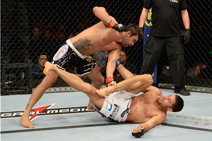 BARUERI, BRAZIL - OCTOBER 9: (L-R) Yan Cabral punches David Mitchell in their welterweight bout during the UFC Fight Night event at the Ginasio Jose Correa on October 9, 2013 in Barueri, Sao Paulo, Brazil. (Photo by Jeff Bottari/Zuffa LLC/Zuffa LLC via G