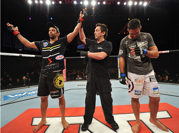 BARUERI, BRAZIL - OCTOBER 9: (L-R) Yan Cabral celebrates after defeating David Mitchell in their welterweight bout during the UFC Fight Night event at the Ginasio Jose Correa on October 9, 2013 in Barueri, Sao Paulo, Brazil. (Photo by Jeff Bottari/Zuffa