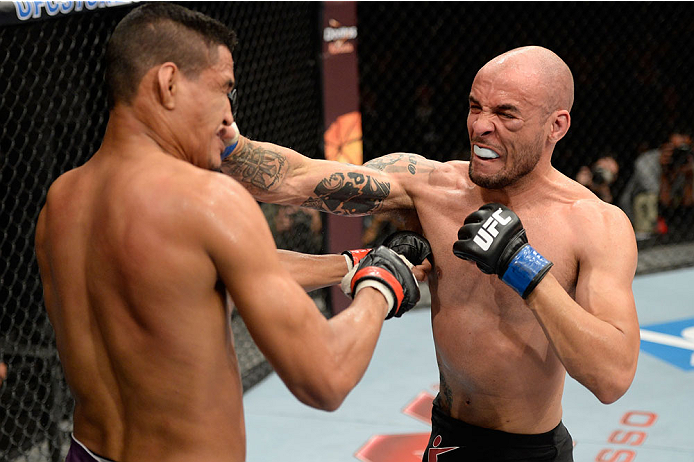BARUERI, BRAZIL - OCTOBER 9: (R-L) Igor Araujo punches Ildemar Alcantara in their welterweight bout during the UFC Fight Night event at the Ginasio Jose Correa on October 9, 2013 in Barueri, Sao Paulo, Brazil. (Photo by Jeff Bottari/Zuffa LLC/Zuffa LLC v