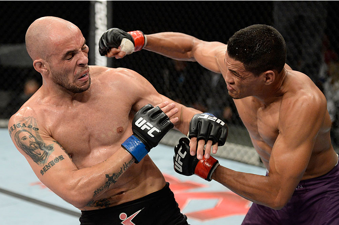 BARUERI, BRAZIL - OCTOBER 9: (R-L) Ildemar Alcantara punches Igor Araujo in their welterweight bout during the UFC Fight Night event at the Ginasio Jose Correa on October 9, 2013 in Barueri, Sao Paulo, Brazil. (Photo by Jeff Bottari/Zuffa LLC/Zuffa LLC v