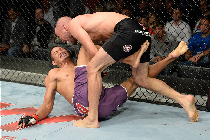 BARUERI, BRAZIL - OCTOBER 9: Igor Araujo (black shorts) takes down Ildemar Alcantara in their welterweight bout during the UFC Fight Night event at the Ginasio Jose Correa on October 9, 2013 in Barueri, Sao Paulo, Brazil. (Photo by Jeff Bottari/Zuffa LLC