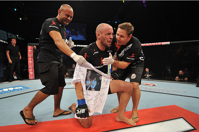 BARUERI, BRAZIL - OCTOBER 9: Igor Araujo shows emotion after defeating Ildemar Alcantara (not pictured) in their welterweight bout during the UFC Fight Night event at the Ginasio Jose Correa on October 9, 2013 in Barueri, Sao Paulo, Brazil. (Photo by Jef