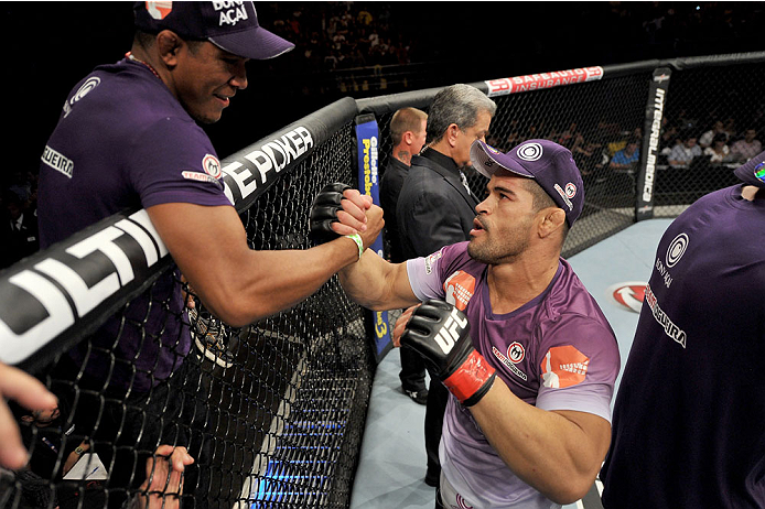 BARUERI, BRAZIL - OCTOBER 9: Rousimar Palhares celebrates with his corner after defeating Mike Pierce (not pictured) in their welterweight bout during the UFC Fight Night event at the Ginasio Jose Correa on October 9, 2013 in Barueri, Sao Paulo, Brazil.