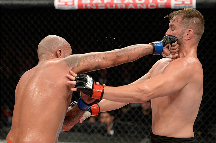 BARUERI, BRAZIL - OCTOBER 9: (L-R) Joey Beltran punches Fabio Maldonado in their light heavyweight bout during the UFC Fight Night event at the Ginasio Jose Correa on October 9, 2013 in Barueri, Sao Paulo, Brazil. (Photo by Jeff Bottari/Zuffa LLC/Zuffa L