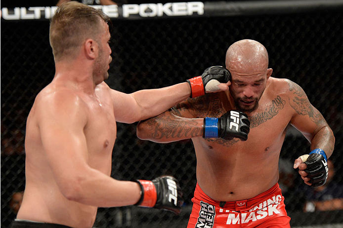 BARUERI, BRAZIL - OCTOBER 9: (L-R) Fabio Maldonado punches Joey Beltran in their light heavyweight bout during the UFC Fight Night event at the Ginasio Jose Correa on October 9, 2013 in Barueri, Sao Paulo, Brazil. (Photo by Jeff Bottari/Zuffa LLC/Zuffa L
