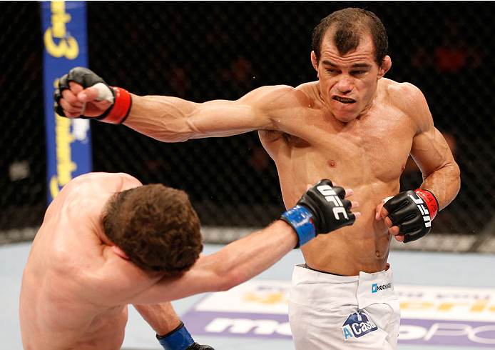 GOIANIA, BRAZIL - NOVEMBER 09: (R-L) Jose Maria throws a spinning back fist at Dustin Ortiz in their flyweight bout during the UFC event at Arena Goiania on November 9, 2013 in Goiania, Brazil. (Photo by Josh Hedges/Zuffa LLC/Zuffa LLC via Getty Images)