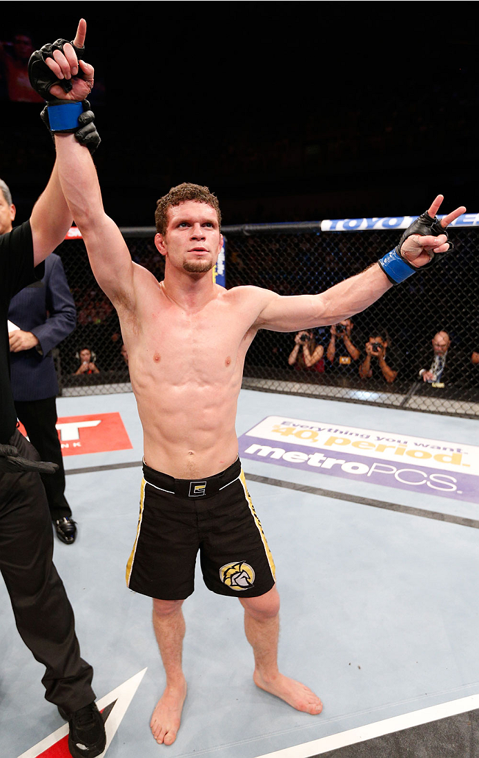 GOIANIA, BRAZIL - NOVEMBER 09: Dustin Ortiz reacts after defeating Jose Maria in their flyweight bout during the UFC event at Arena Goiania on November 9, 2013 in Goiania, Brazil. (Photo by Josh Hedges/Zuffa LLC/Zuffa LLC via Getty Images)