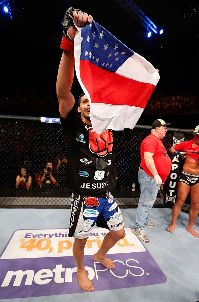 GOIANIA, BRAZIL - NOVEMBER 09: Adriano Martins reacts after his submission victory over Daron Cruickshank in their lightweight bout during the UFC event at Arena Goiania on November 9, 2013 in Goiania, Brazil. (Photo by Josh Hedges/Zuffa LLC/Zuffa LLC via